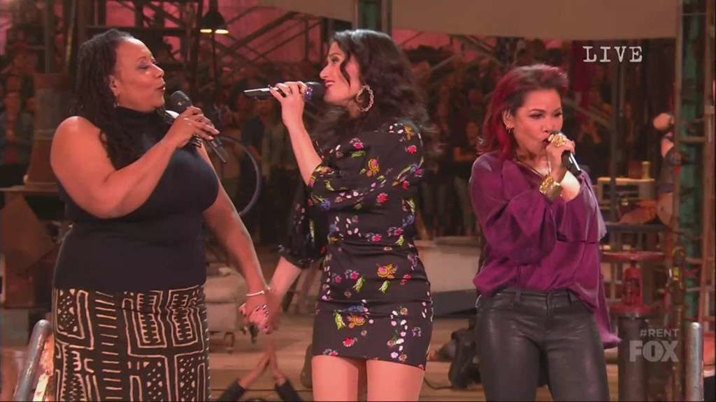 OBC members Fredi Walker, Idina Menzel, and Daphne Rubin-Vega during the reprise of "Seasons of Love" during the curtain call.